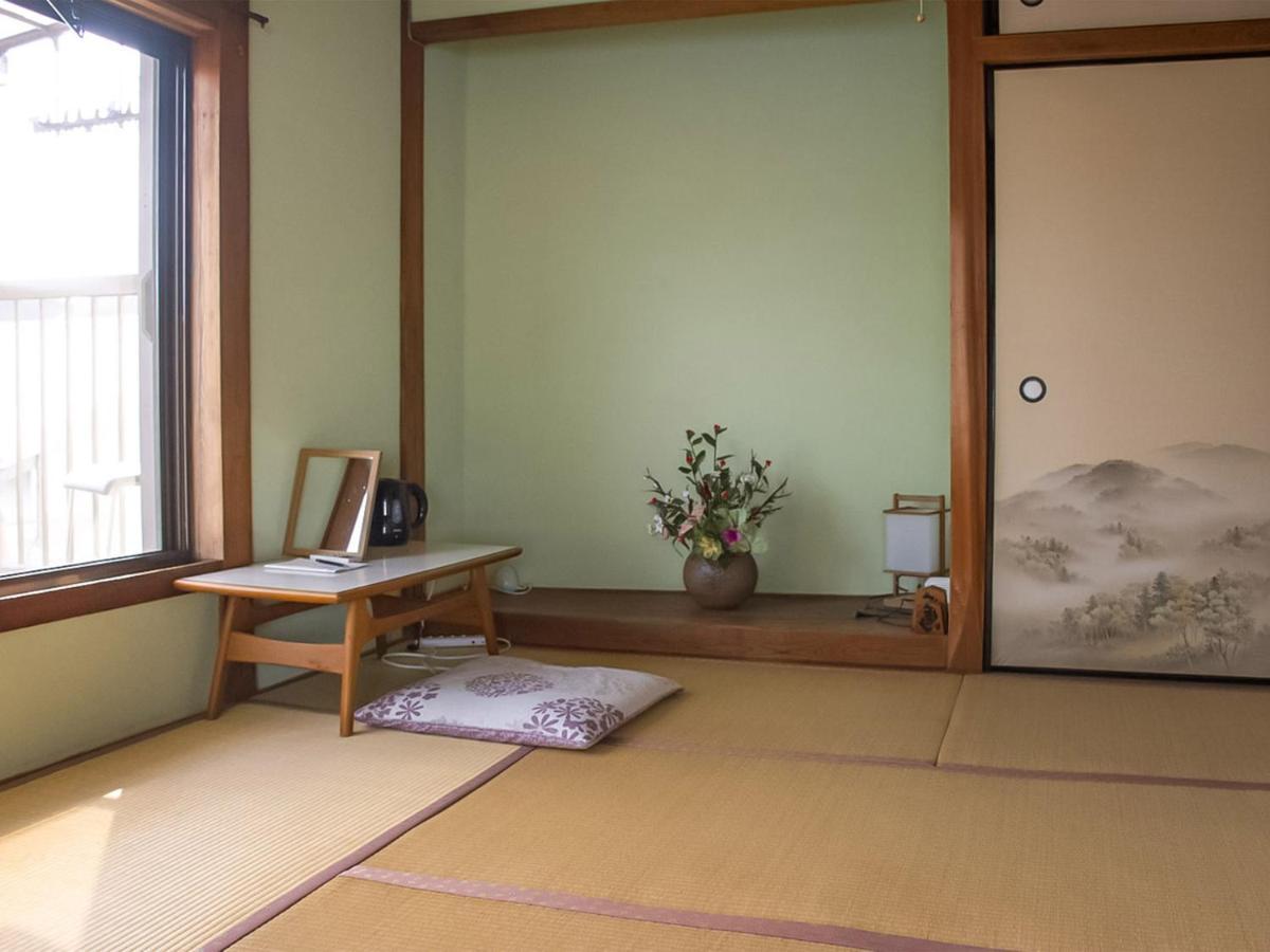 Guest Cafe Kuchikumano Hotel Kamitondacho Exterior photo